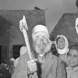 Elderly Druze Carrying an Axe