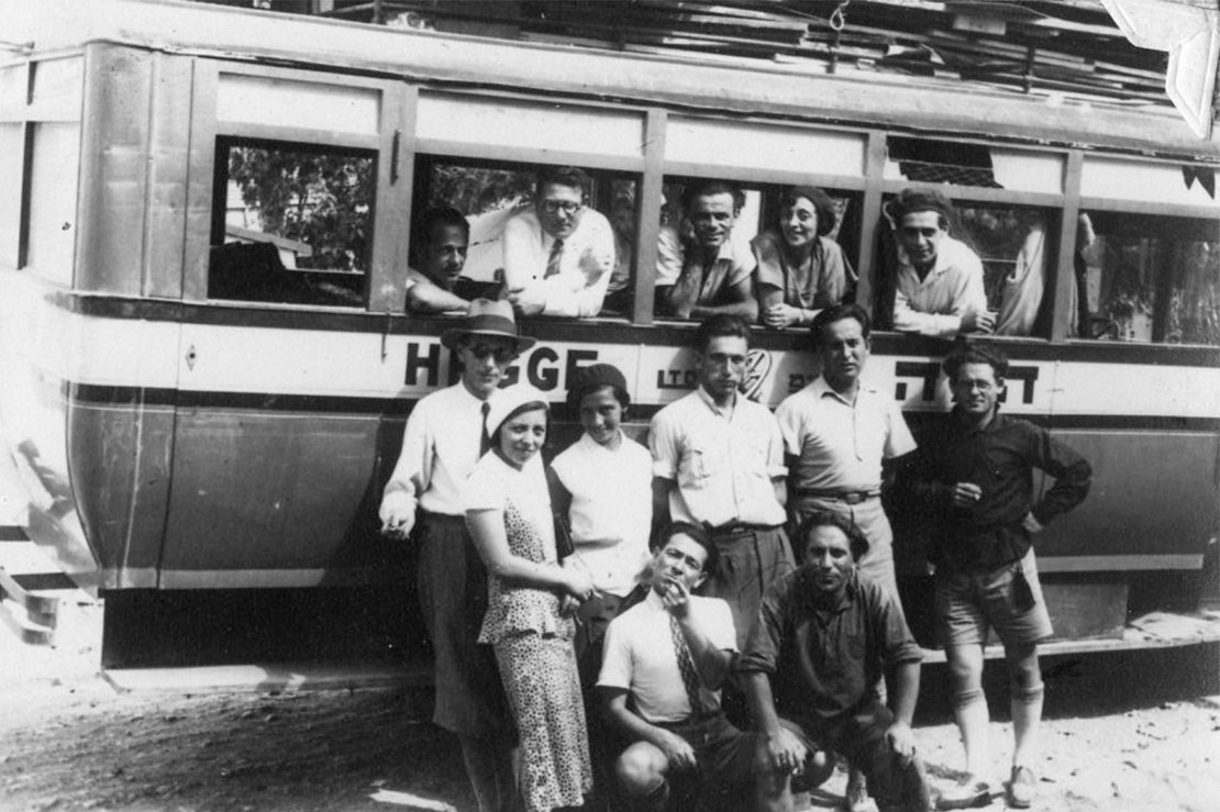 Members of the "HaMatate" theatre troupe on the way to a performance. Moshe Wilensky is in the left window (The Moshe Wilensky Archive, MUS 0069)